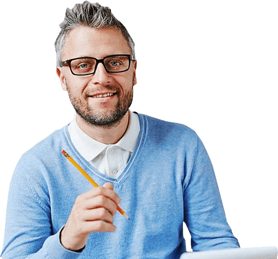 Man in blue sweater holding pencil - Wellness Psychotherapy Troy Michigan