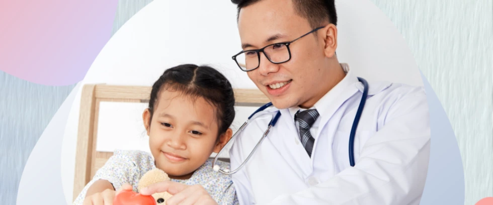 Pediatrician working with a patient