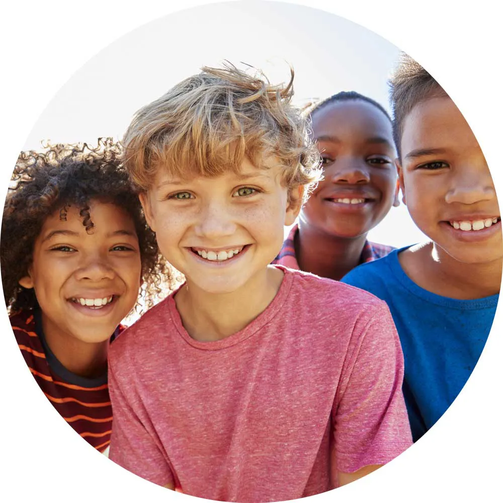 a group of diverse children smiling